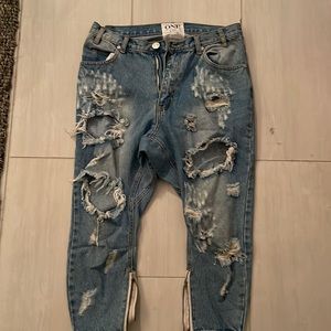 Never worn one teaspoon blue ripped jeans great piece to wear with loose tee